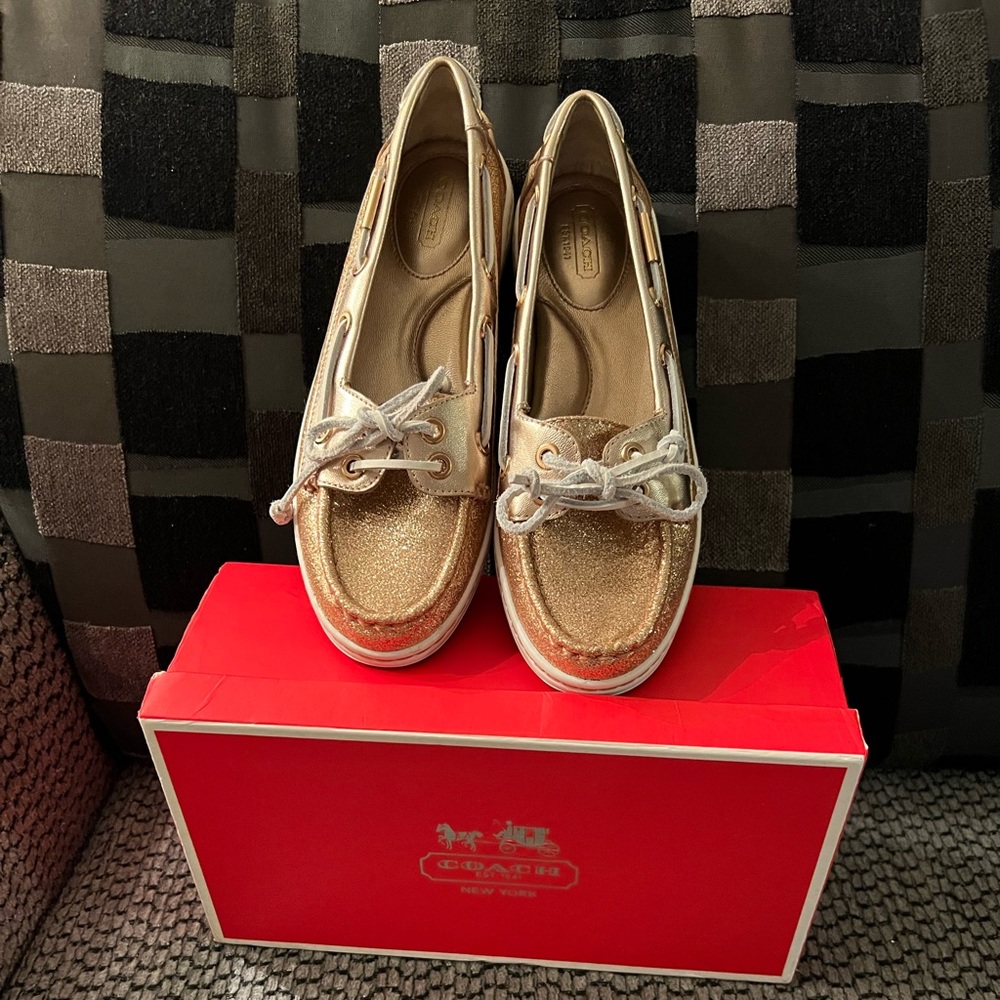 New Coach shoes Sz. 7 new with original box . Never worn.